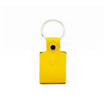 Charger l&#39;image dans la galerie, Porte-clés en cuir recyclé WOODSTAG jaune
